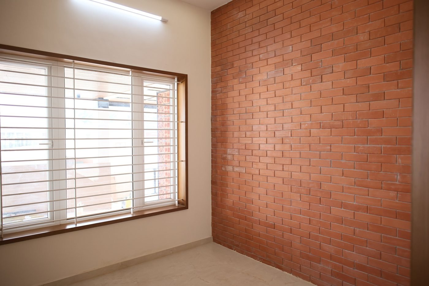 Room with exposed brick wall