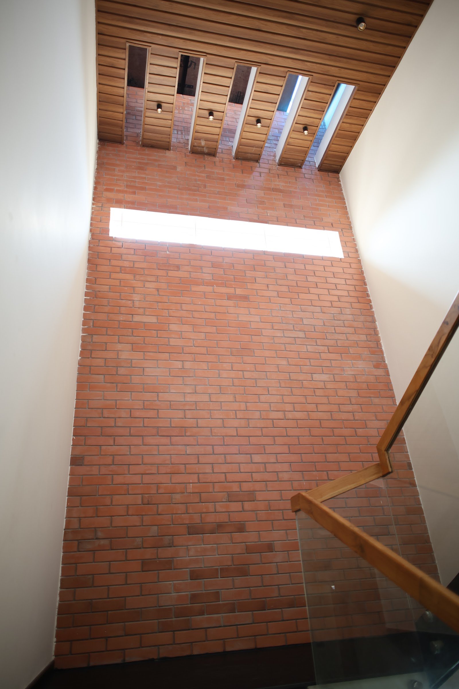 Brick wall above the staircase at Terra Bliss